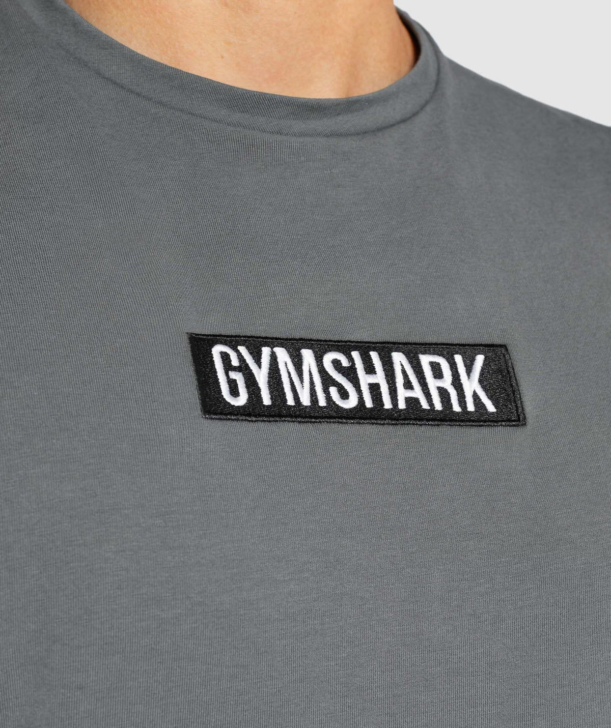 gymshark-central-drop-arm-tank-charcoal-aw21