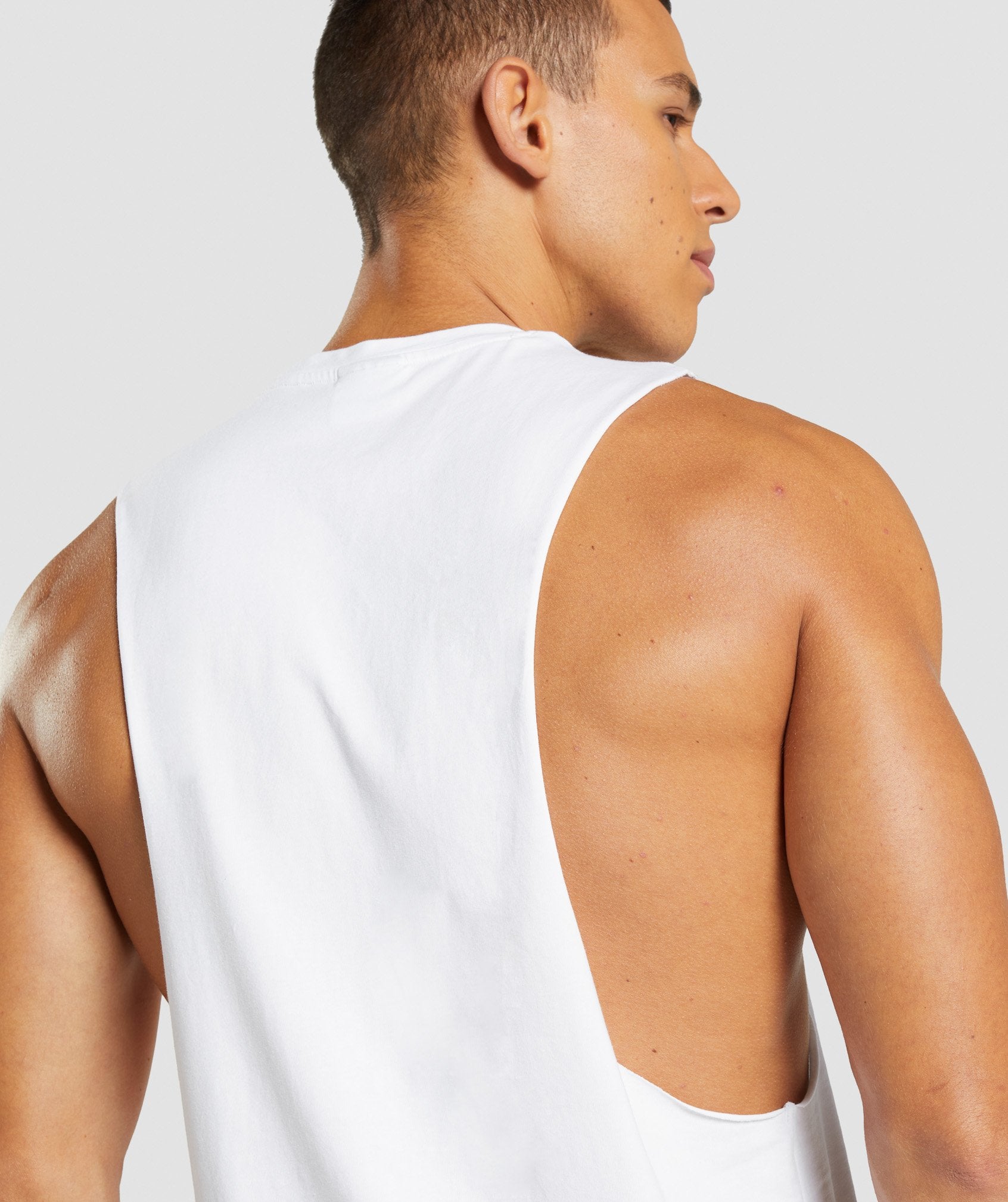 gymshark-central-drop-arm-tank-white-aw21