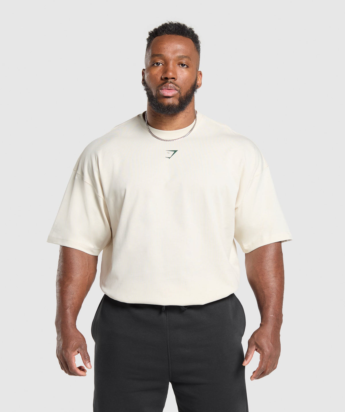 gymshark-lifting-club-t-shirt-oat-white-classic-green-ss25