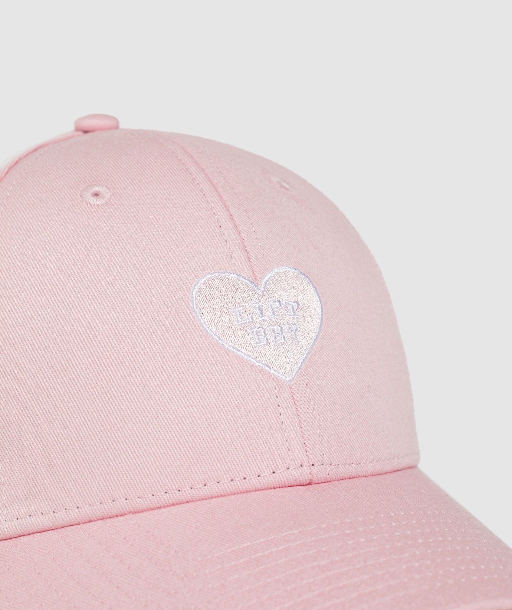 gymshark-cotton-graphic-cap-dolly-pink-ss24