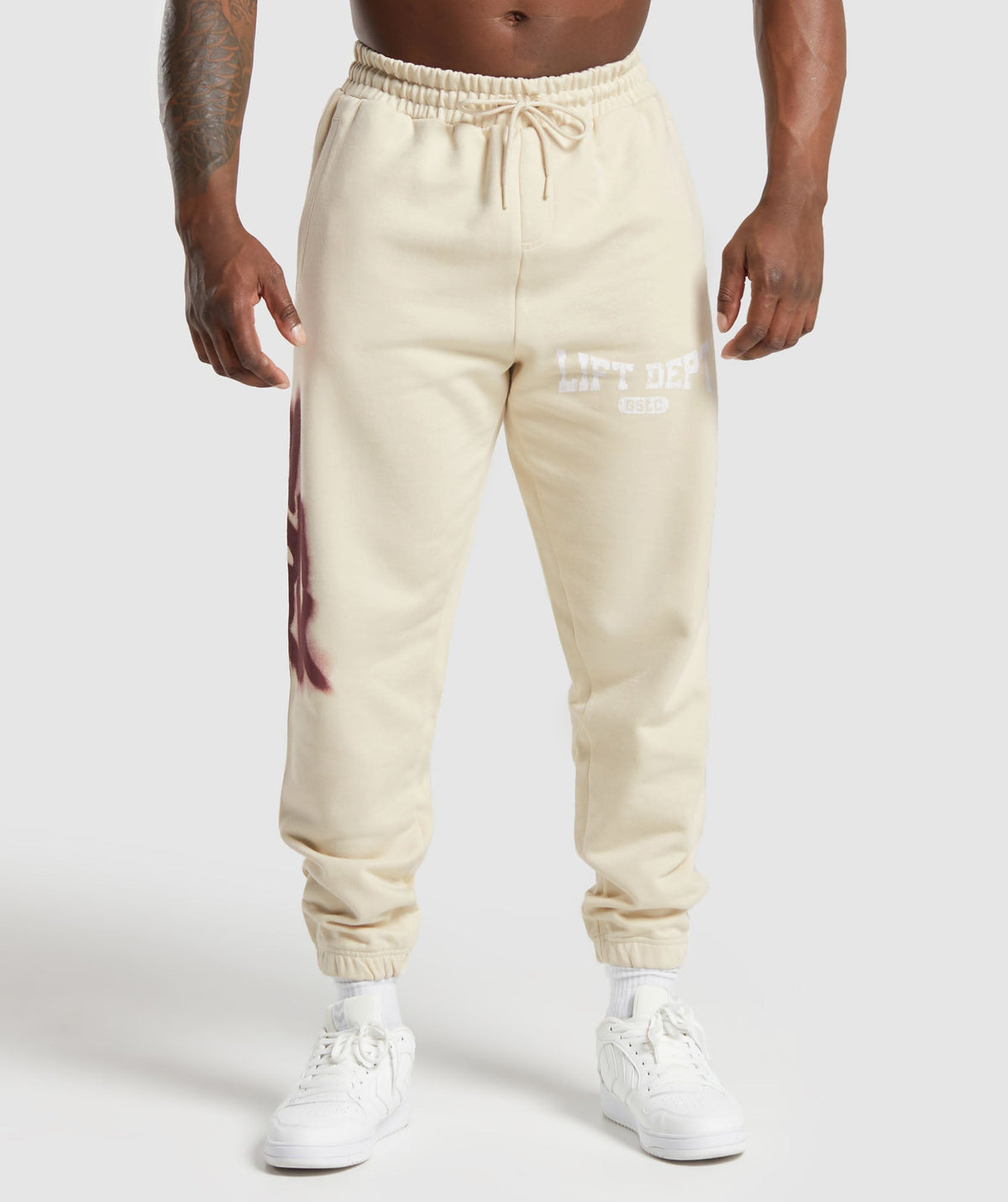 gymshark-lifting-department-graffiti-joggers-ecru-white-ss24