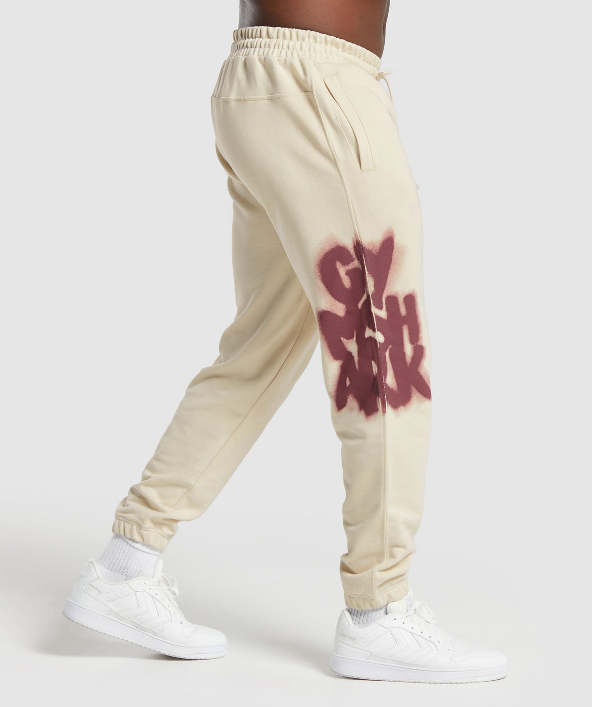 gymshark-lifting-department-graffiti-joggers-ecru-white-ss24