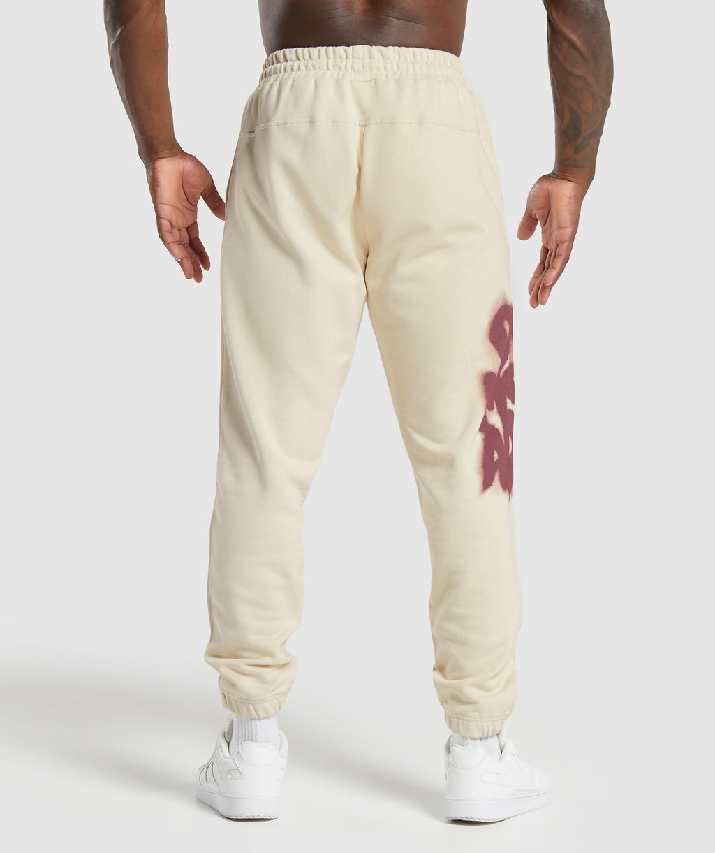 gymshark-lifting-department-graffiti-joggers-ecru-white-ss24
