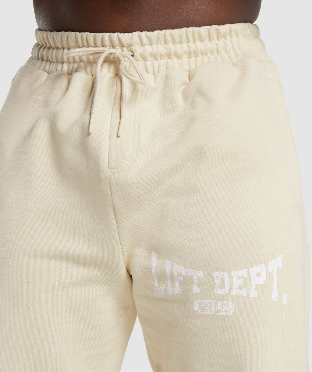 gymshark-lifting-department-graffiti-joggers-ecru-white-ss24