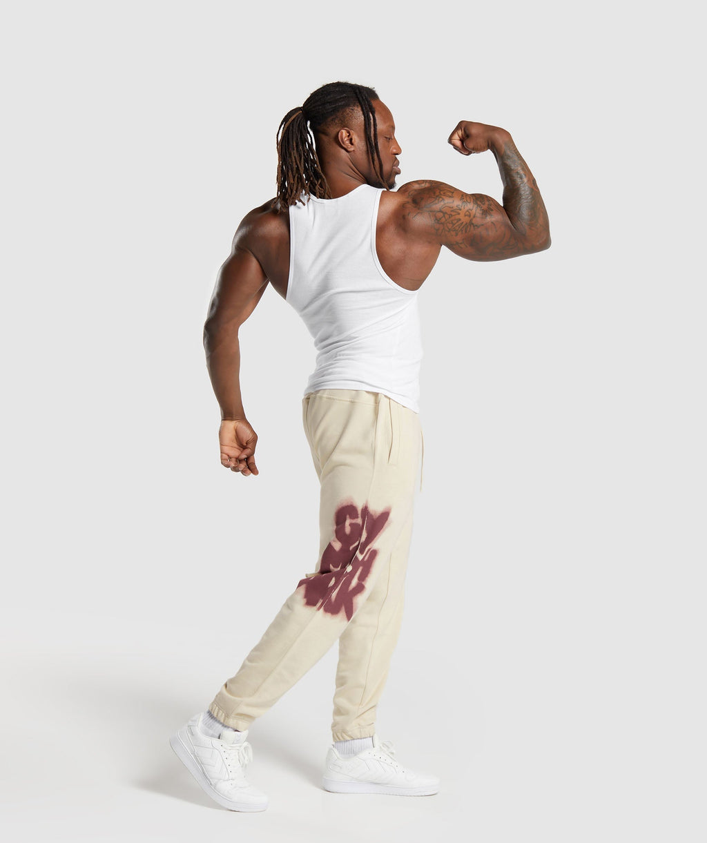 gymshark-lifting-department-graffiti-joggers-ecru-white-ss24