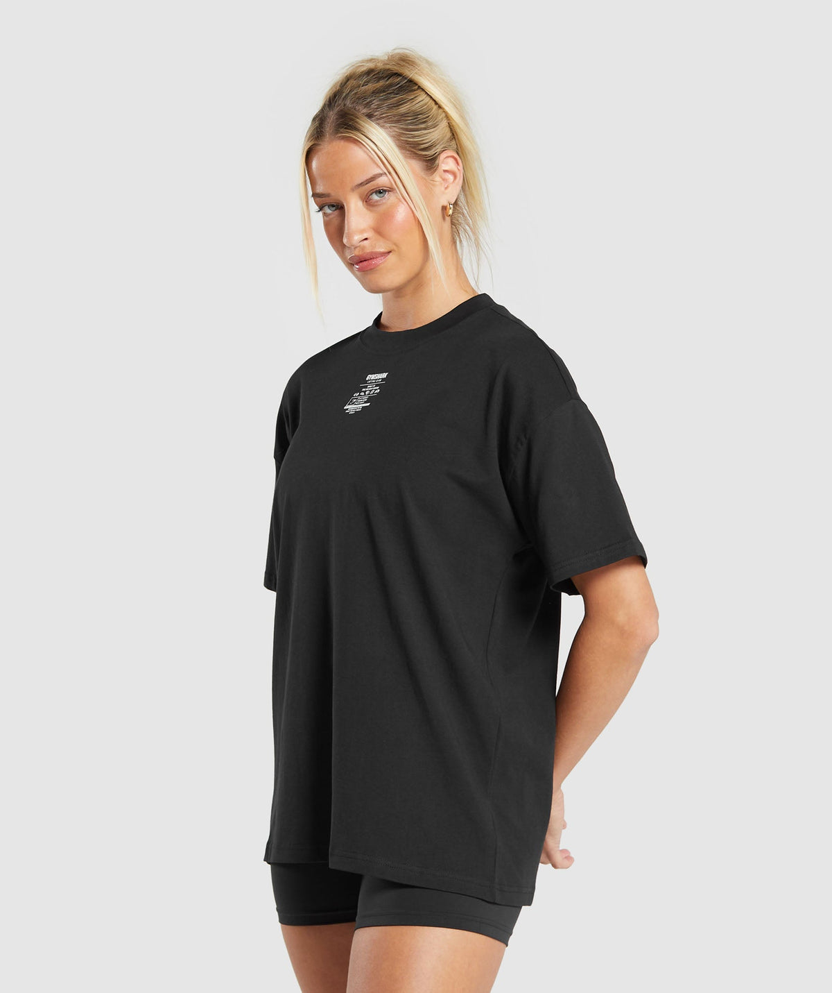 gymshark-care-label-graphic-oversized-t-shirt-black-aw24