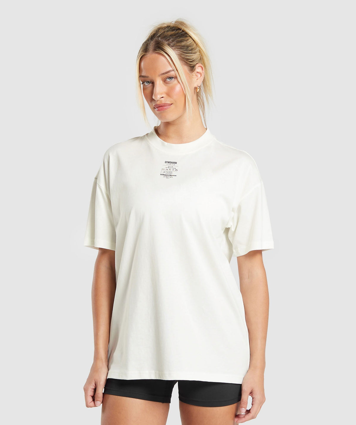 gymshark-care-label-graphic-oversized-t-shirt-soft-white-aw24