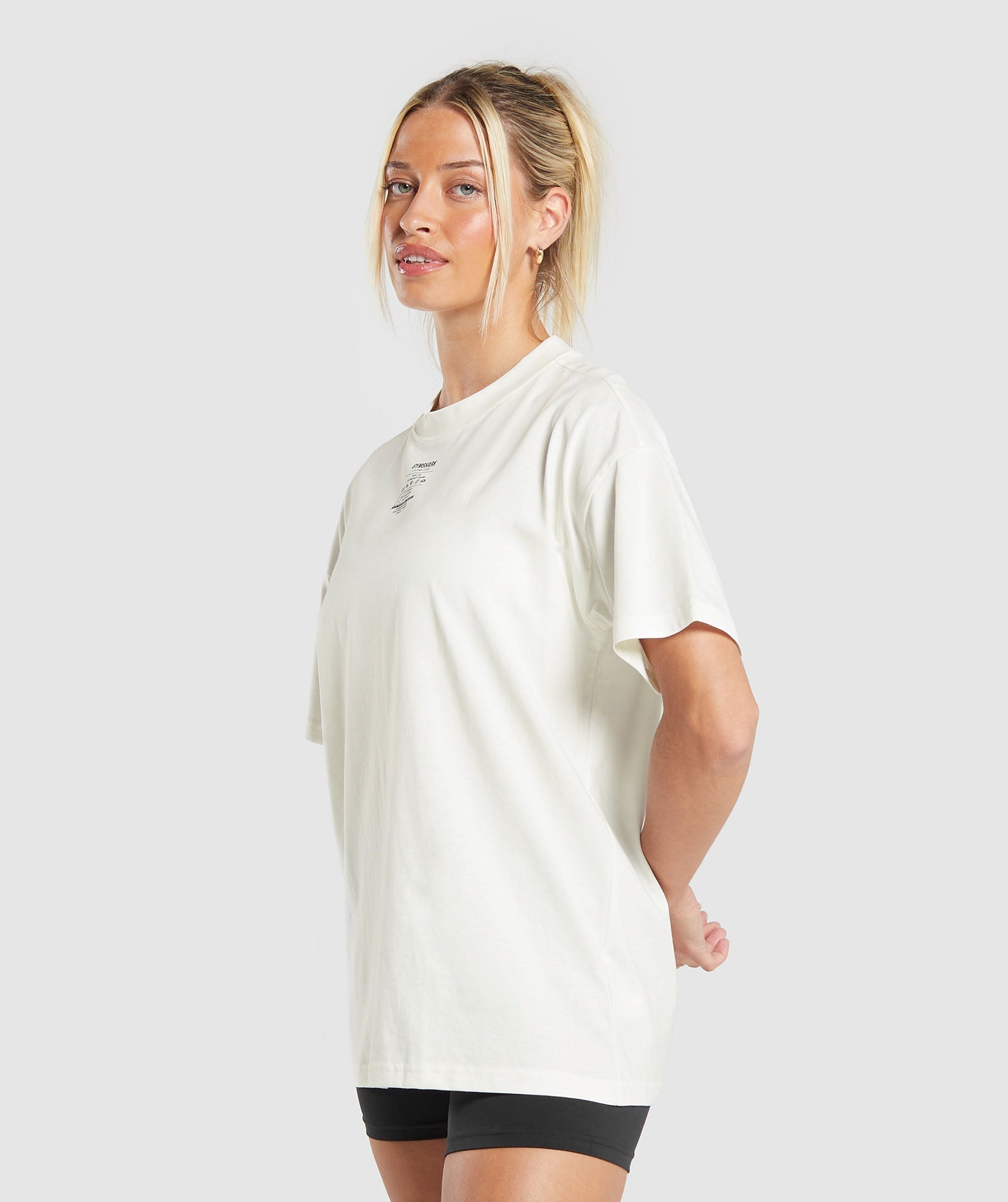 gymshark-care-label-graphic-oversized-t-shirt-soft-white-aw24