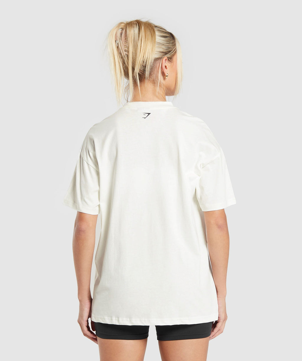 gymshark-care-label-graphic-oversized-t-shirt-soft-white-aw24