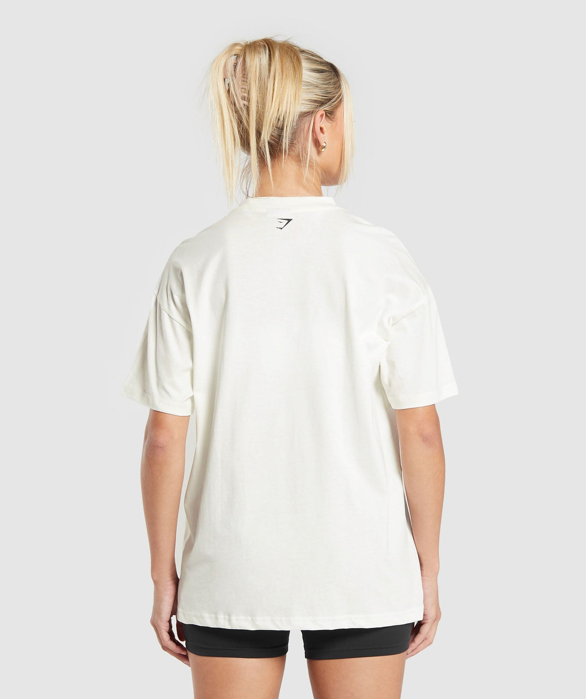 gymshark-care-label-graphic-oversized-t-shirt-soft-white-aw24