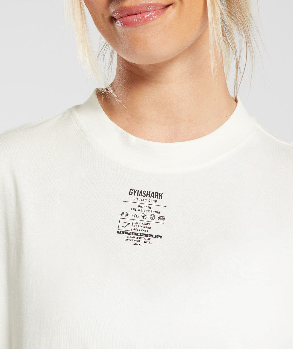 gymshark-care-label-graphic-oversized-t-shirt-soft-white-aw24