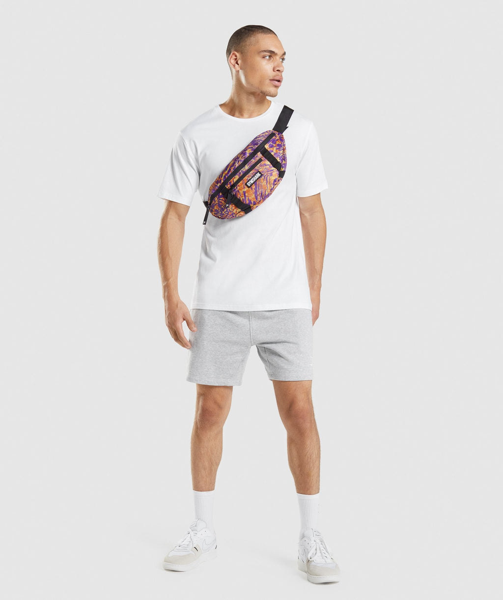 gymshark-manimal-sling-bag-orange-print-aw21