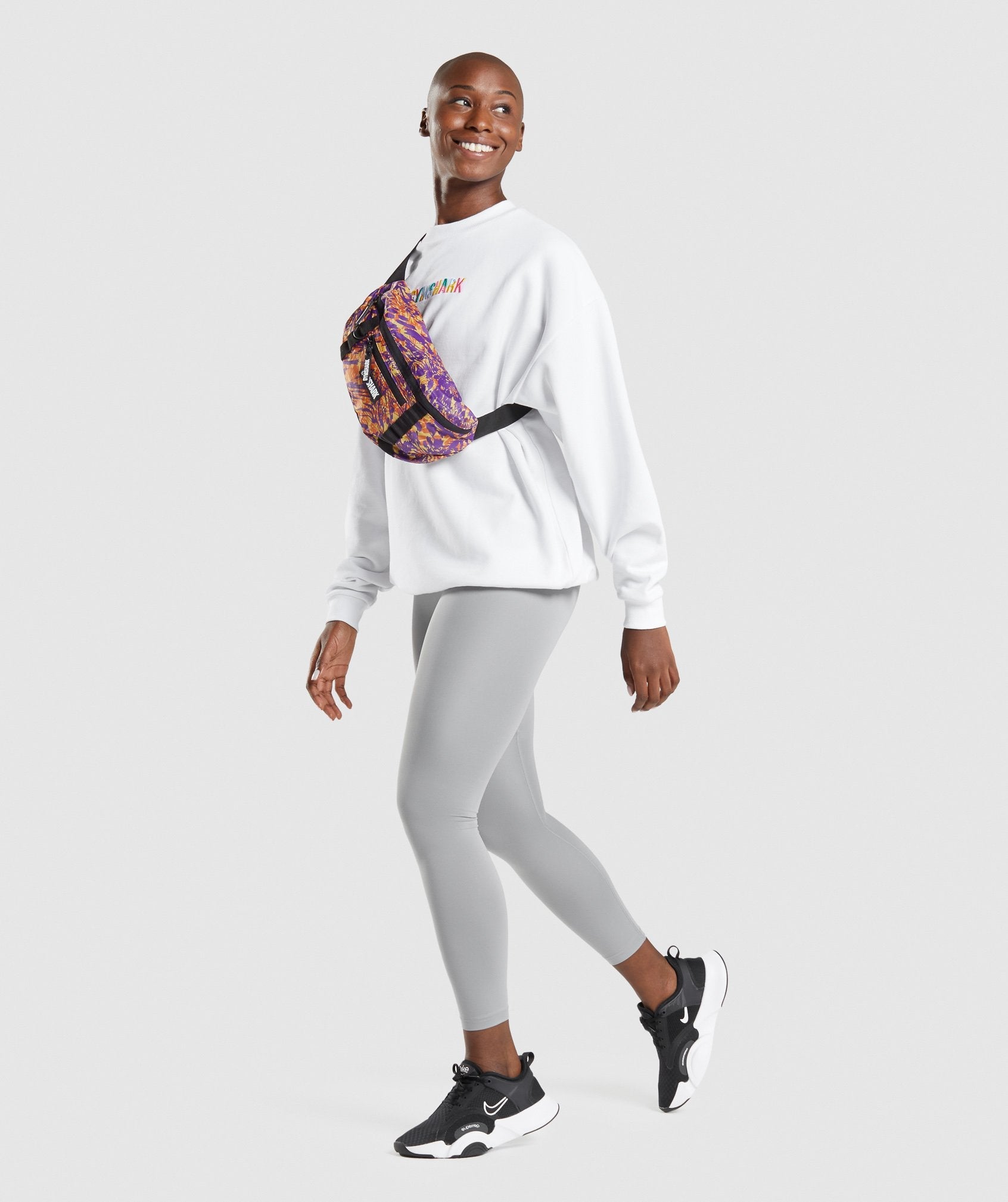 gymshark-manimal-sling-bag-orange-print-aw21