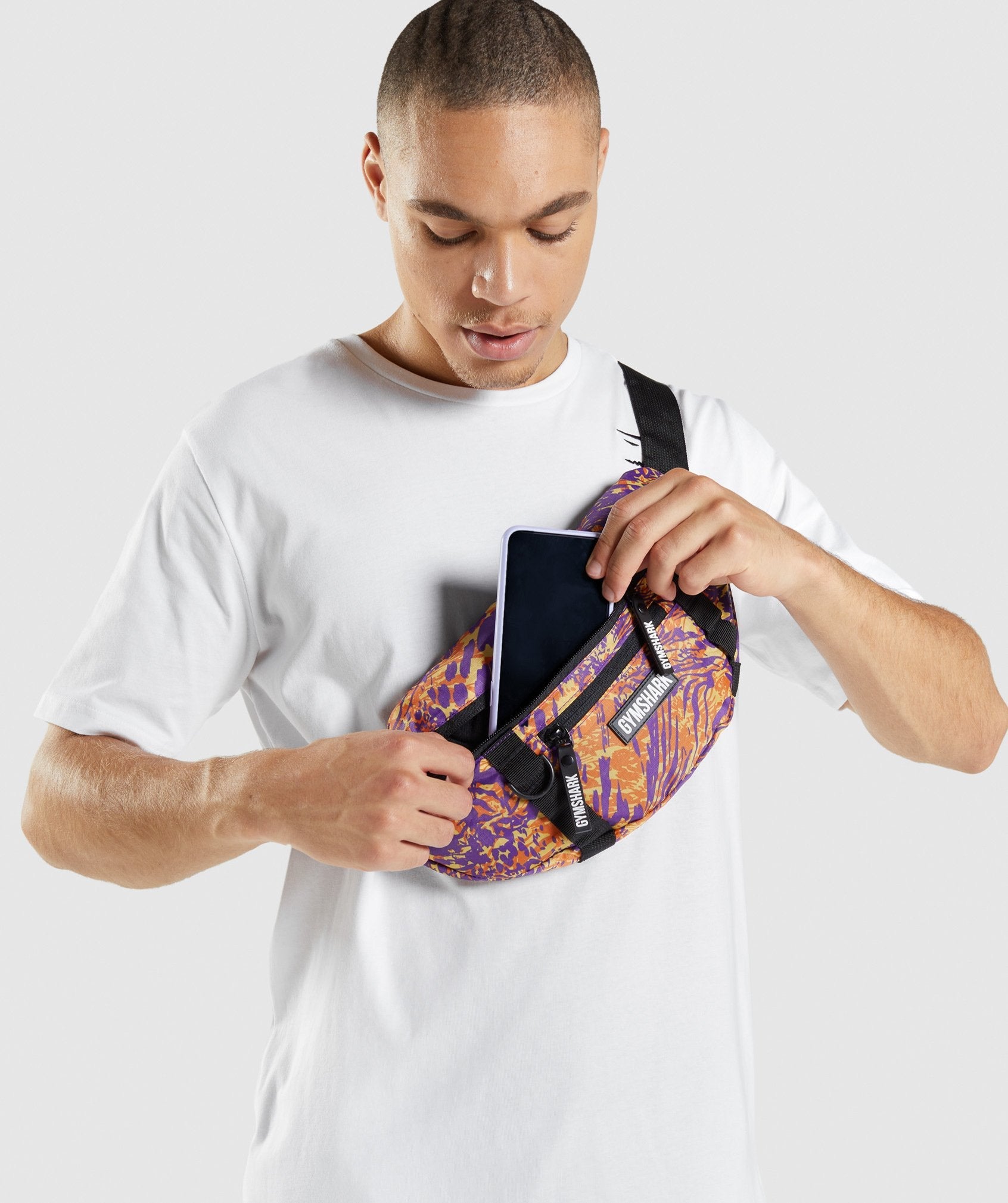 gymshark-manimal-sling-bag-orange-print-aw21