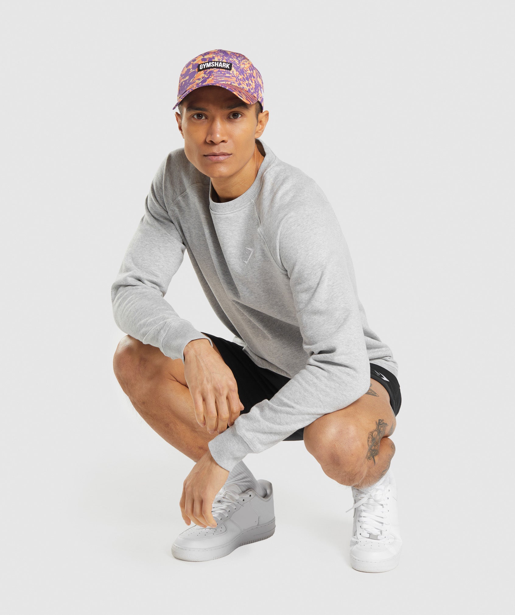 gymshark-animal-print-snapback-orange-print-aw21