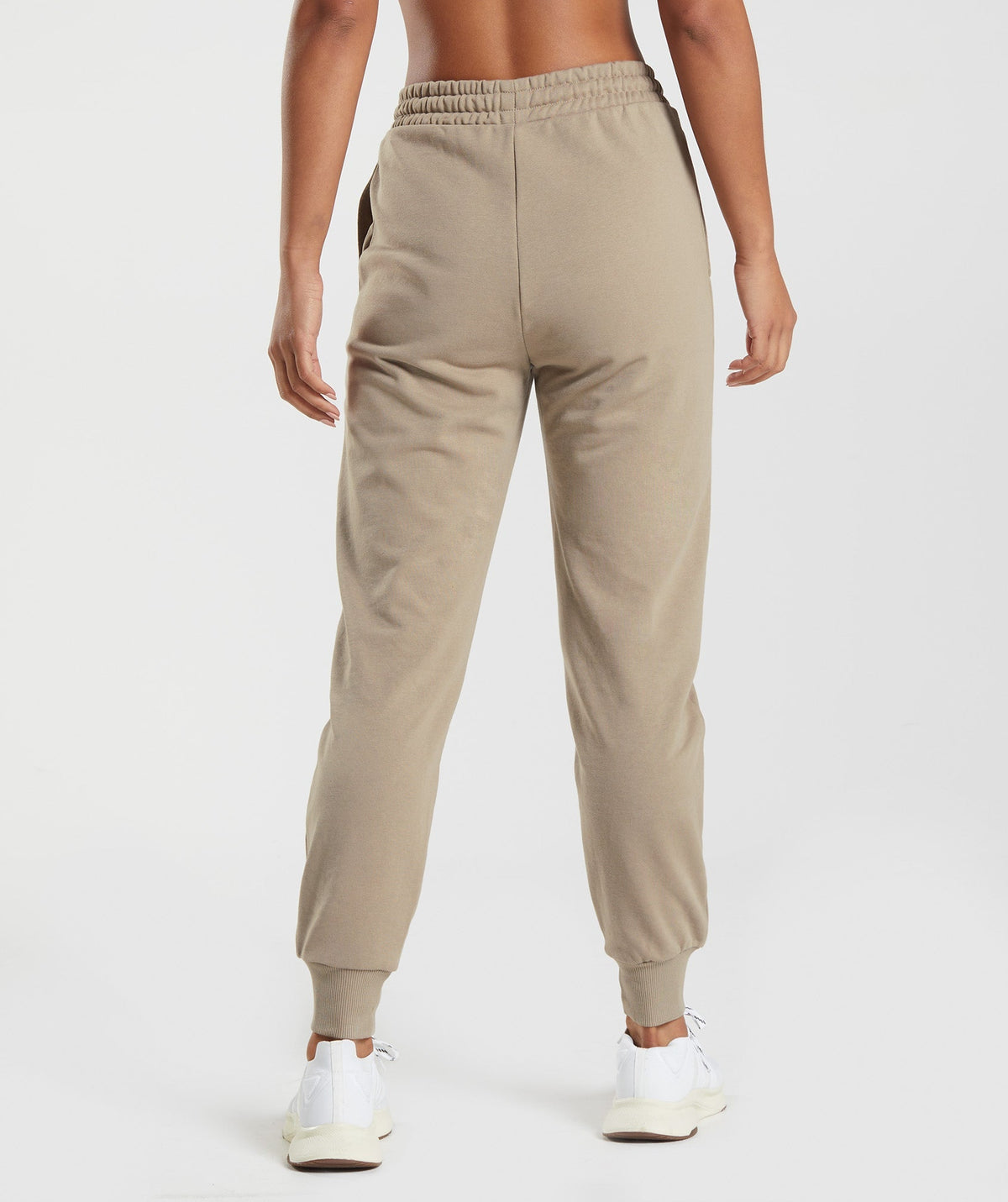 gymshark-social-club-joggers-cement-brown-aw22