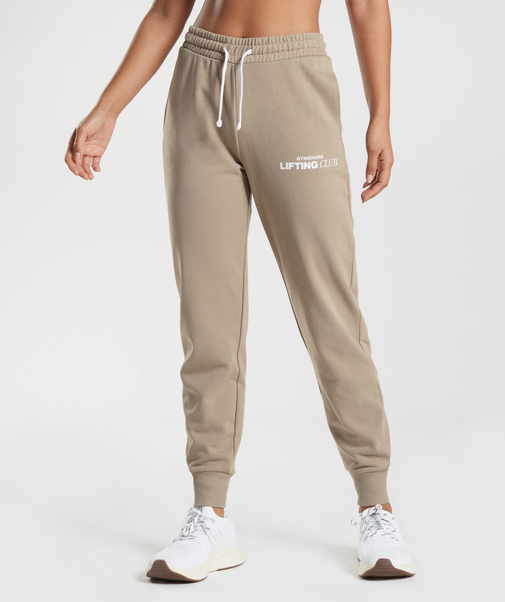 gymshark-social-club-joggers-cement-brown-aw22