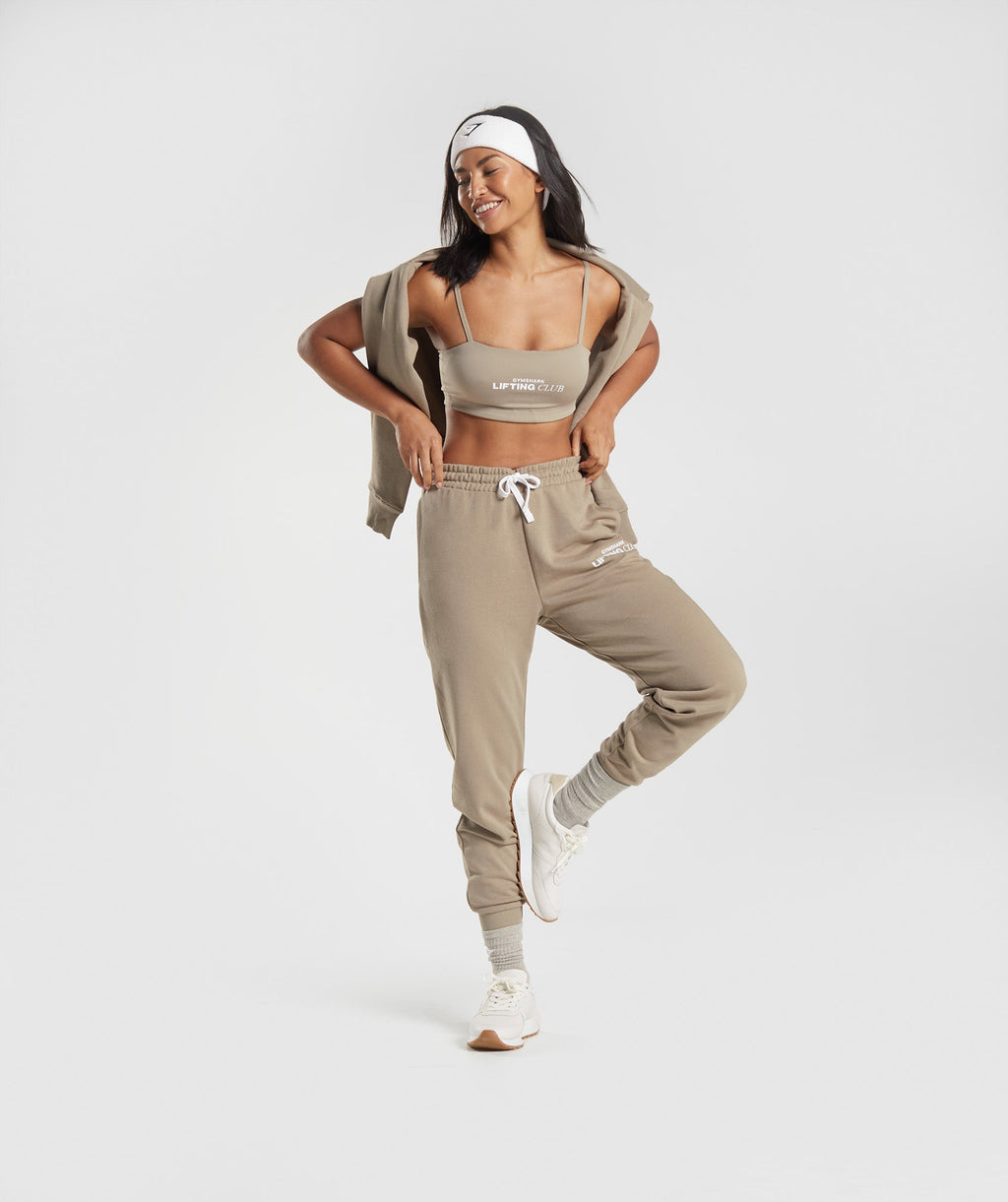 gymshark-social-club-joggers-cement-brown-aw22
