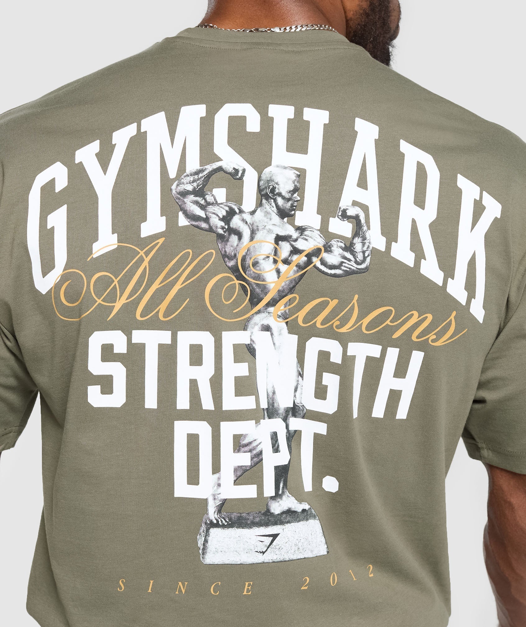 gymshark-trophy-graphic-t-shirt-base-green-aw24