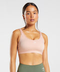 gymshark-fraction-sports-bra-clay-pink-aw22
