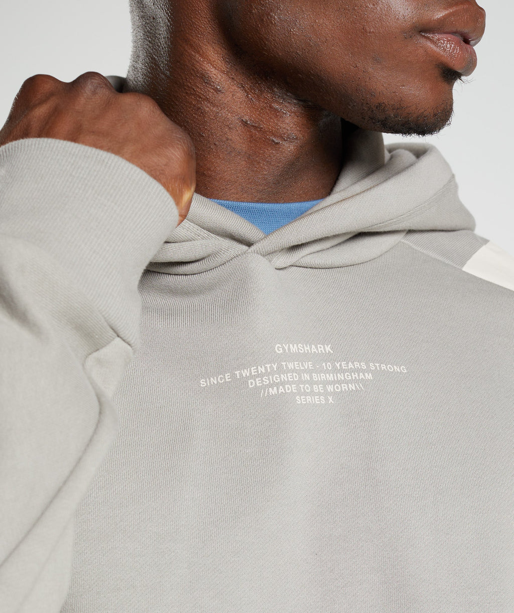 gymshark-gs10-year-hoodie-ecru-brown-mens-aw22