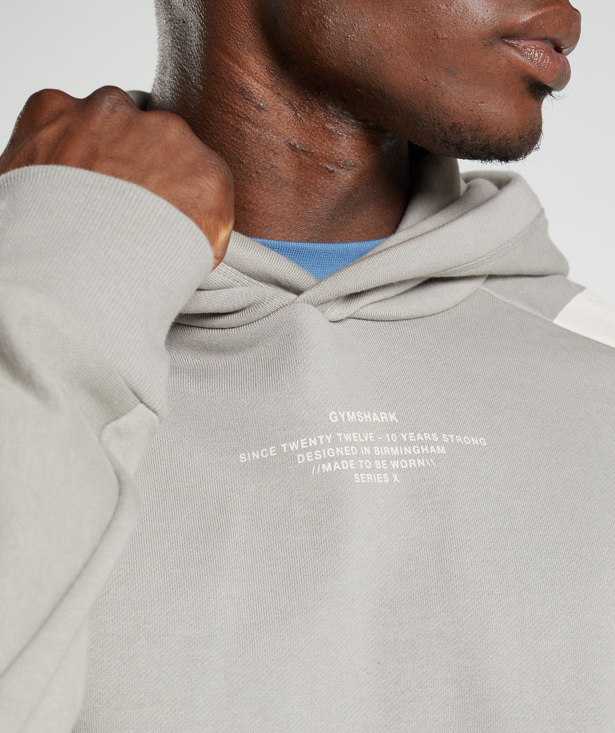 gymshark-gs10-year-hoodie-ecru-brown-mens-aw22