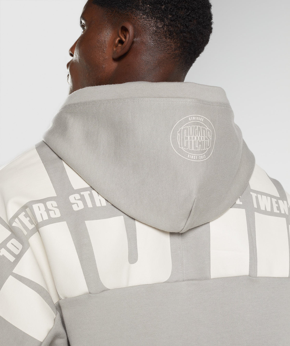 gymshark-gs10-year-hoodie-ecru-brown-mens-aw22