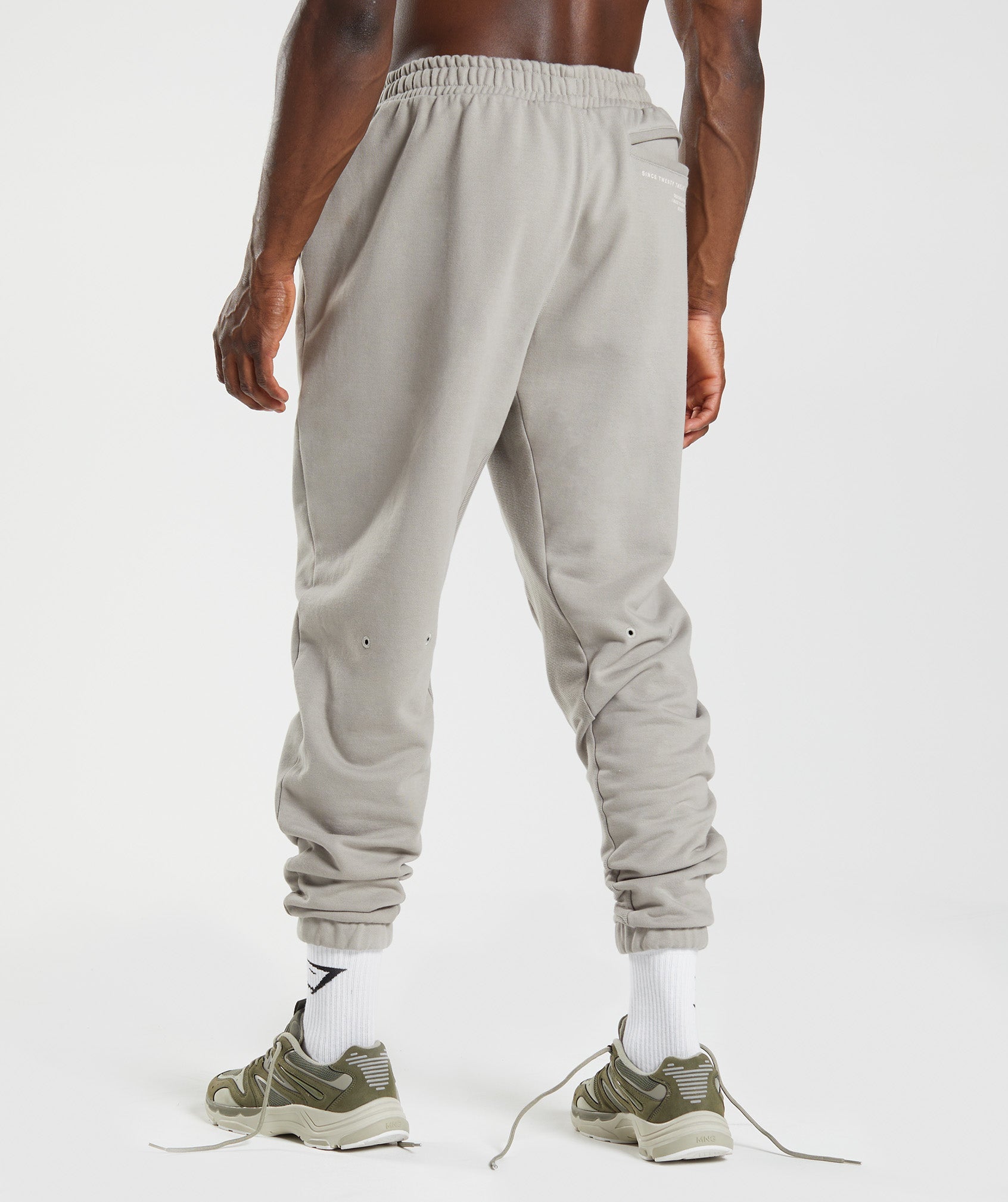 gymshark-gs10-year-joggers-ecru-brown-aw22