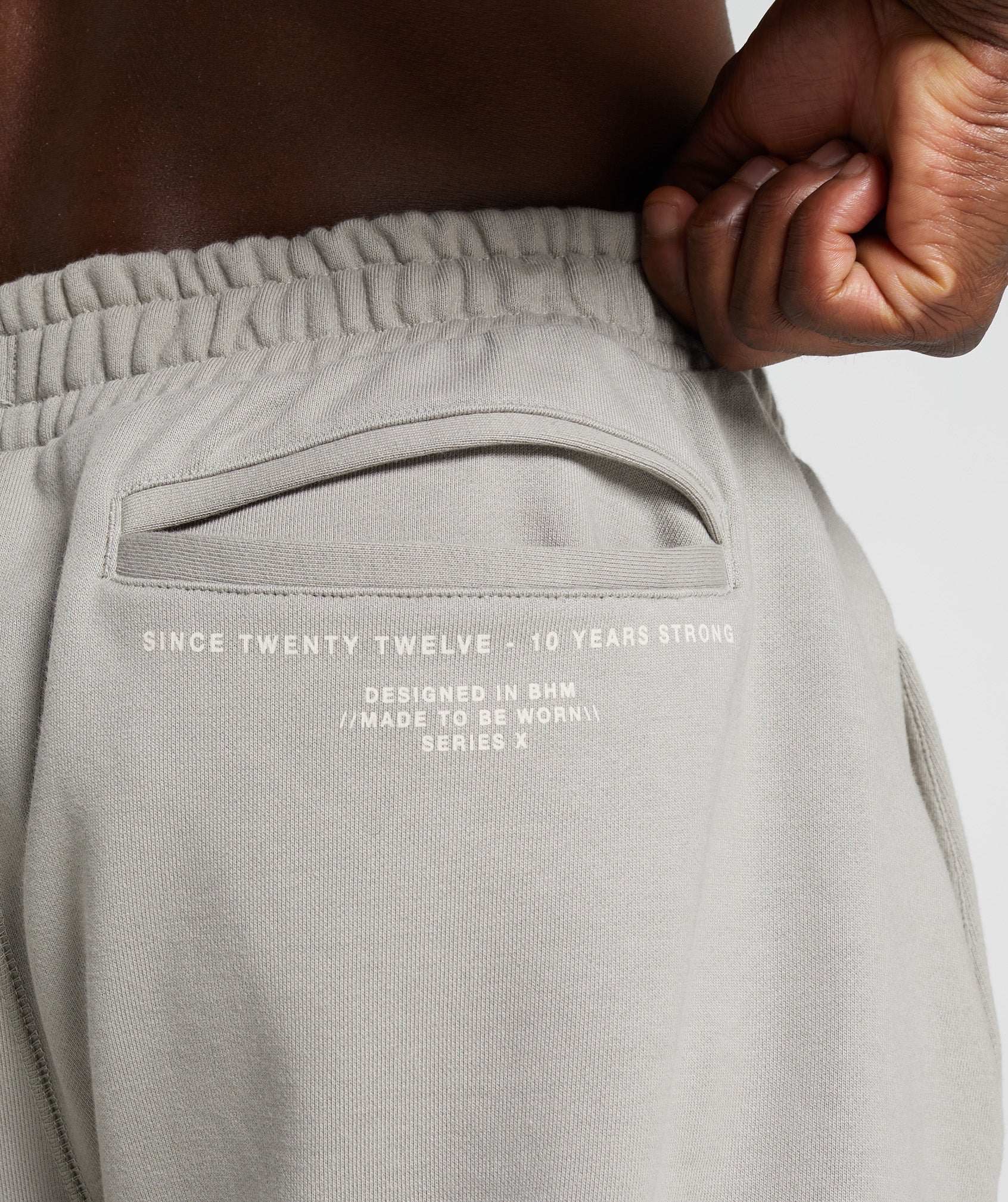 gymshark-gs10-year-joggers-ecru-brown-aw22