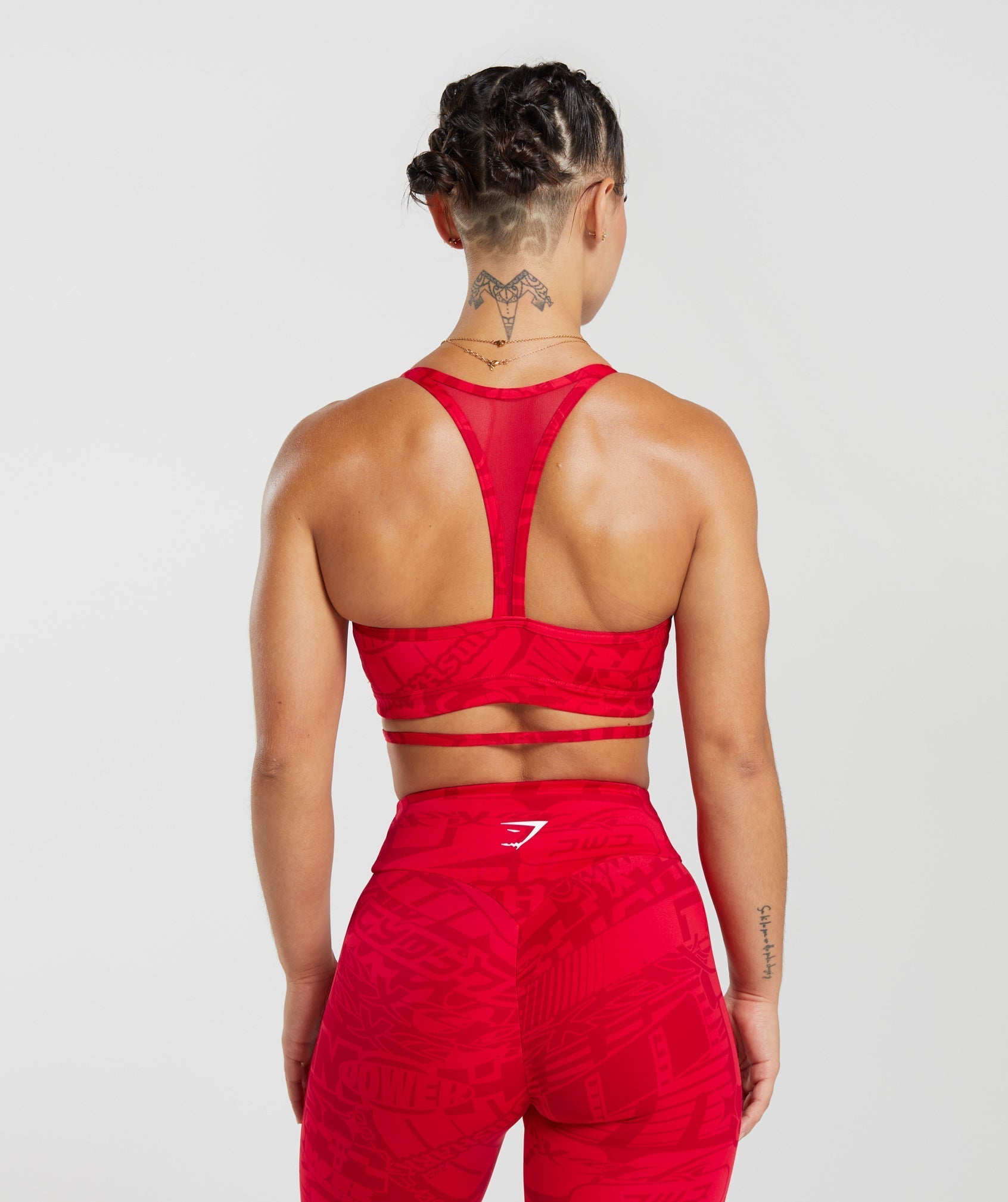 gs-power-strappy-sports-bra-zesty-red-aw23