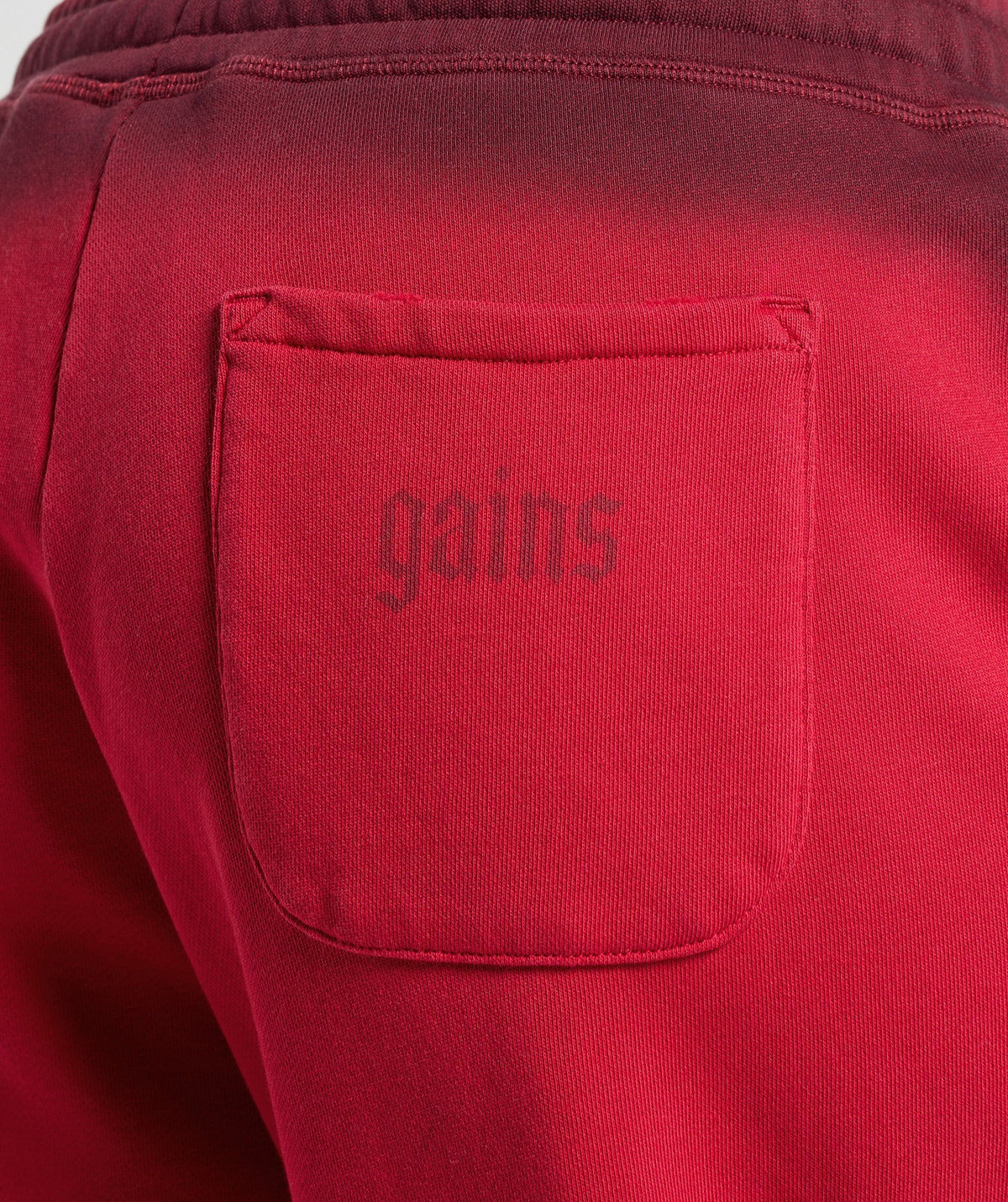 gymshark-gains-washed-loopback-joggers-red-ss25