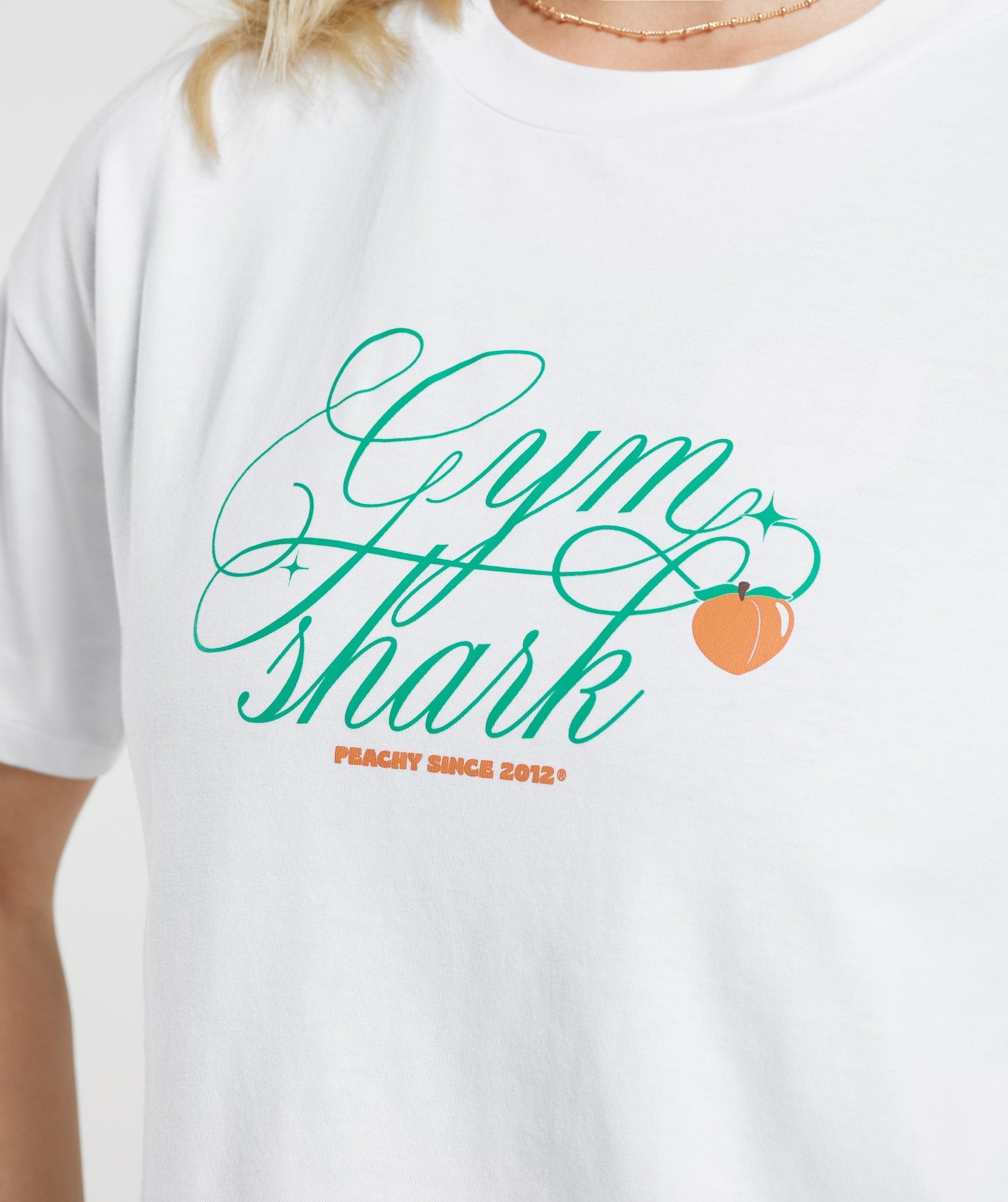 gymshark-strong-peach-midi-top-white