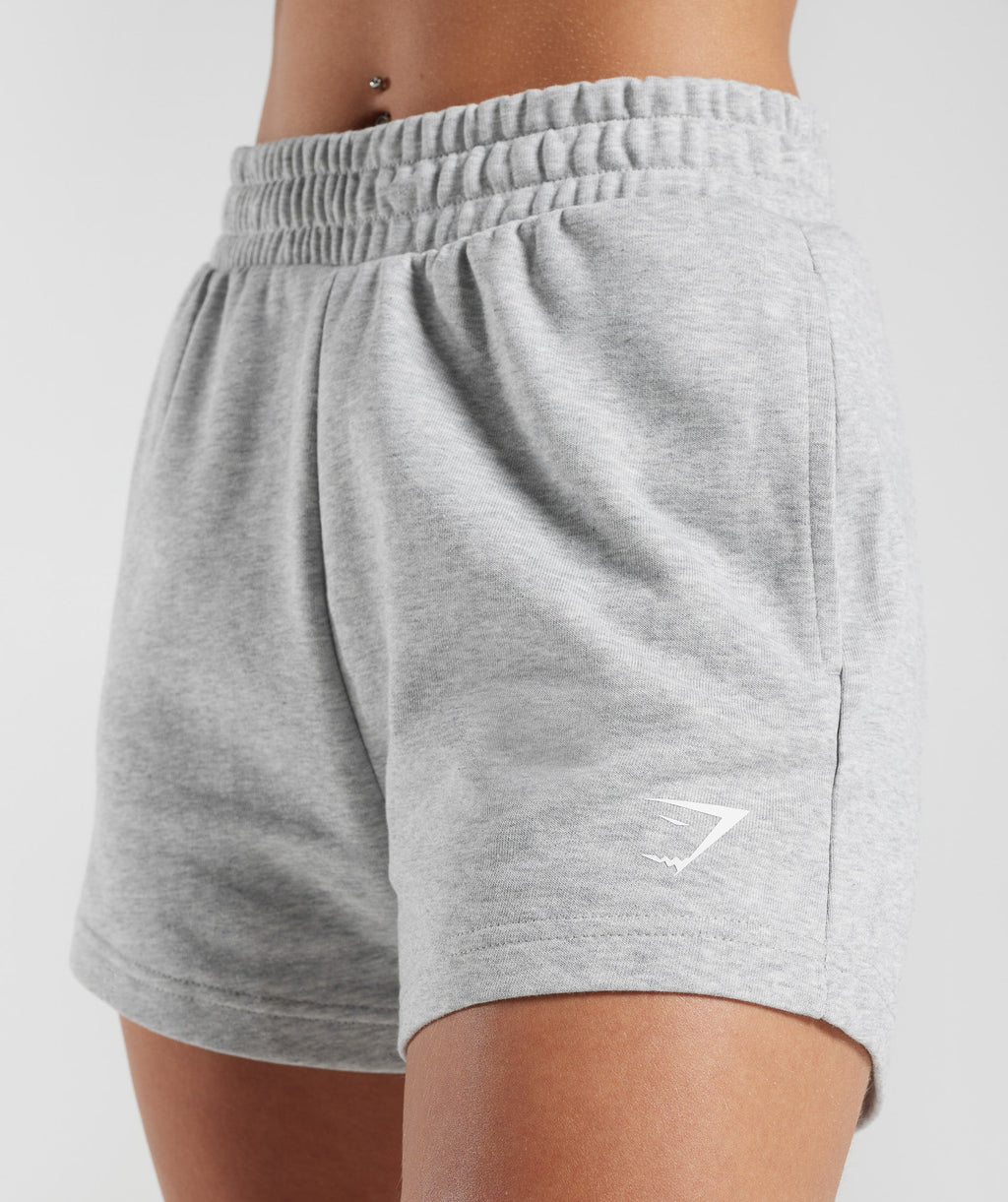 gymshark-strong-peach-graphic-shorts-light-grey-marl-ss23