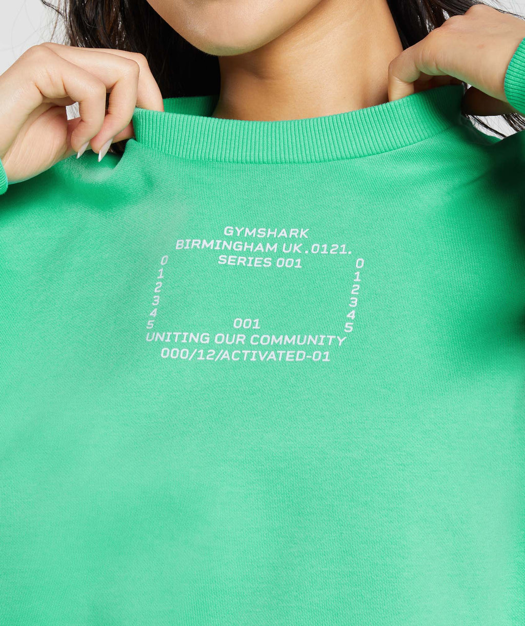 gymshark-activated-graphic-sweatshirt-tropic-green-ss23