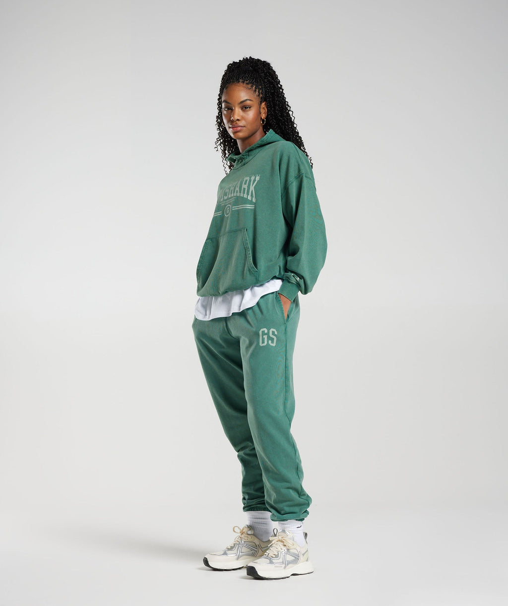gymshark-collegiate-oversized-hoodie-ink-teal-ss23