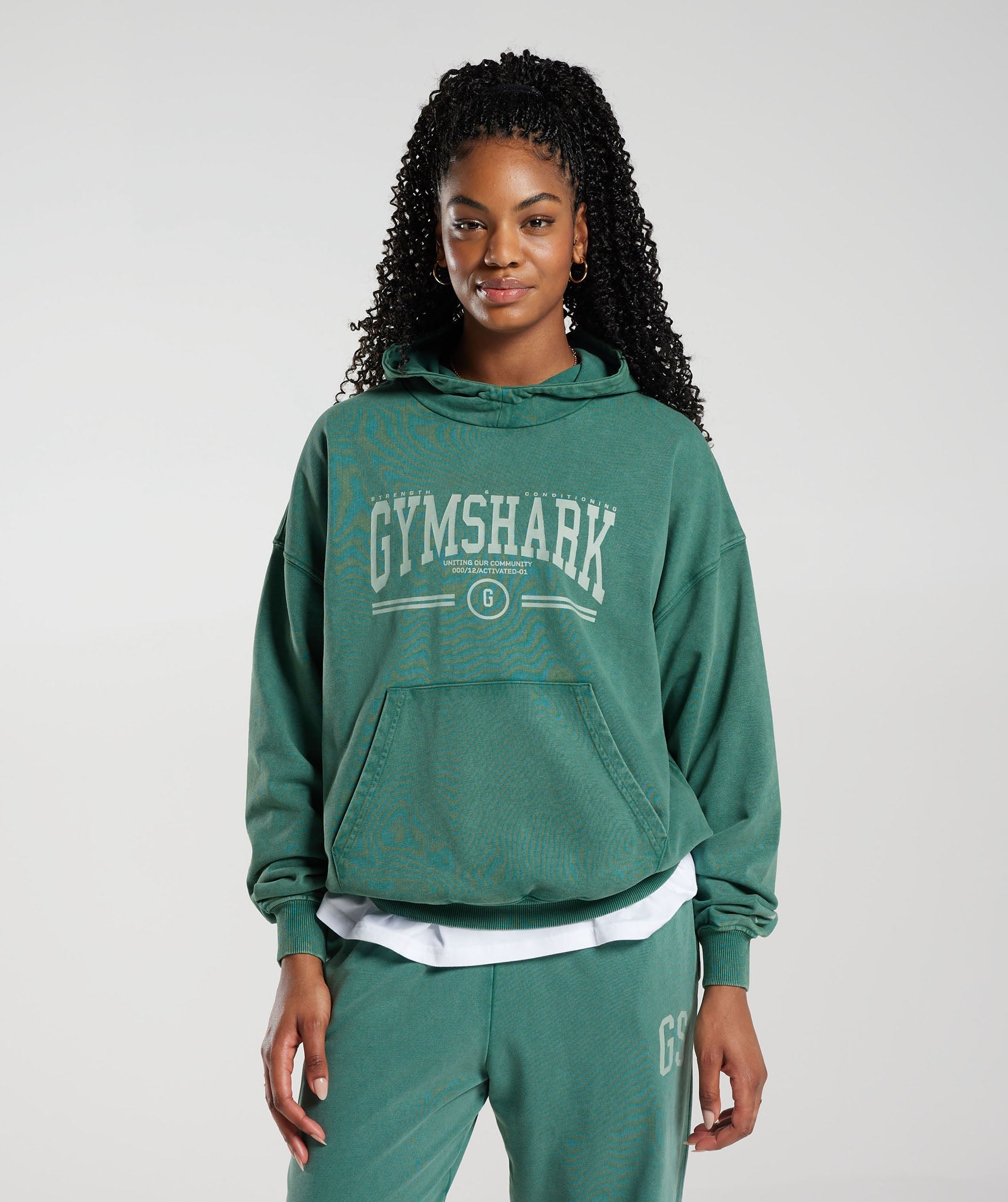 gymshark-collegiate-oversized-hoodie-ink-teal-ss23