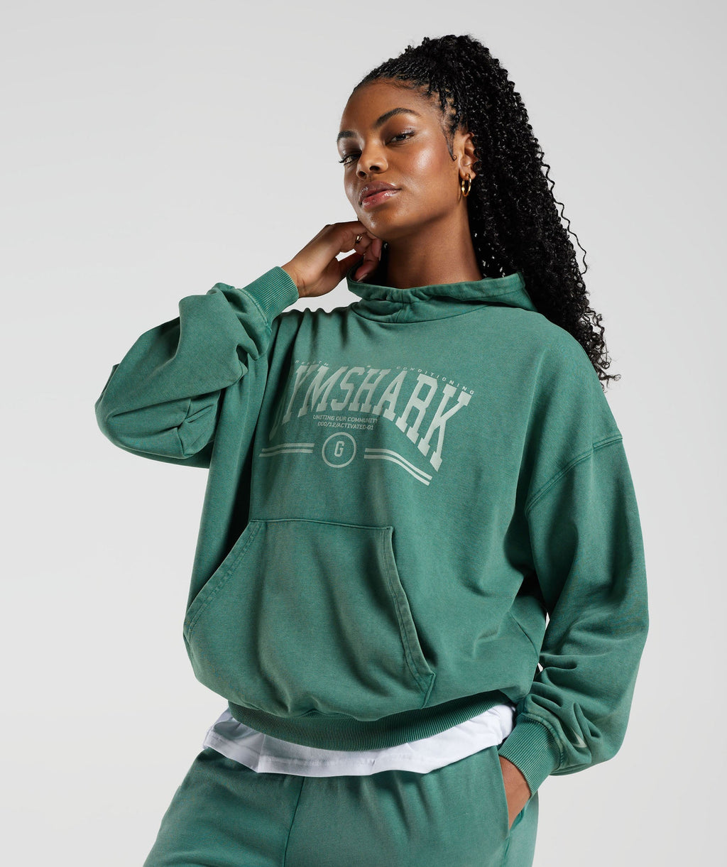 gymshark-collegiate-oversized-hoodie-ink-teal-ss23