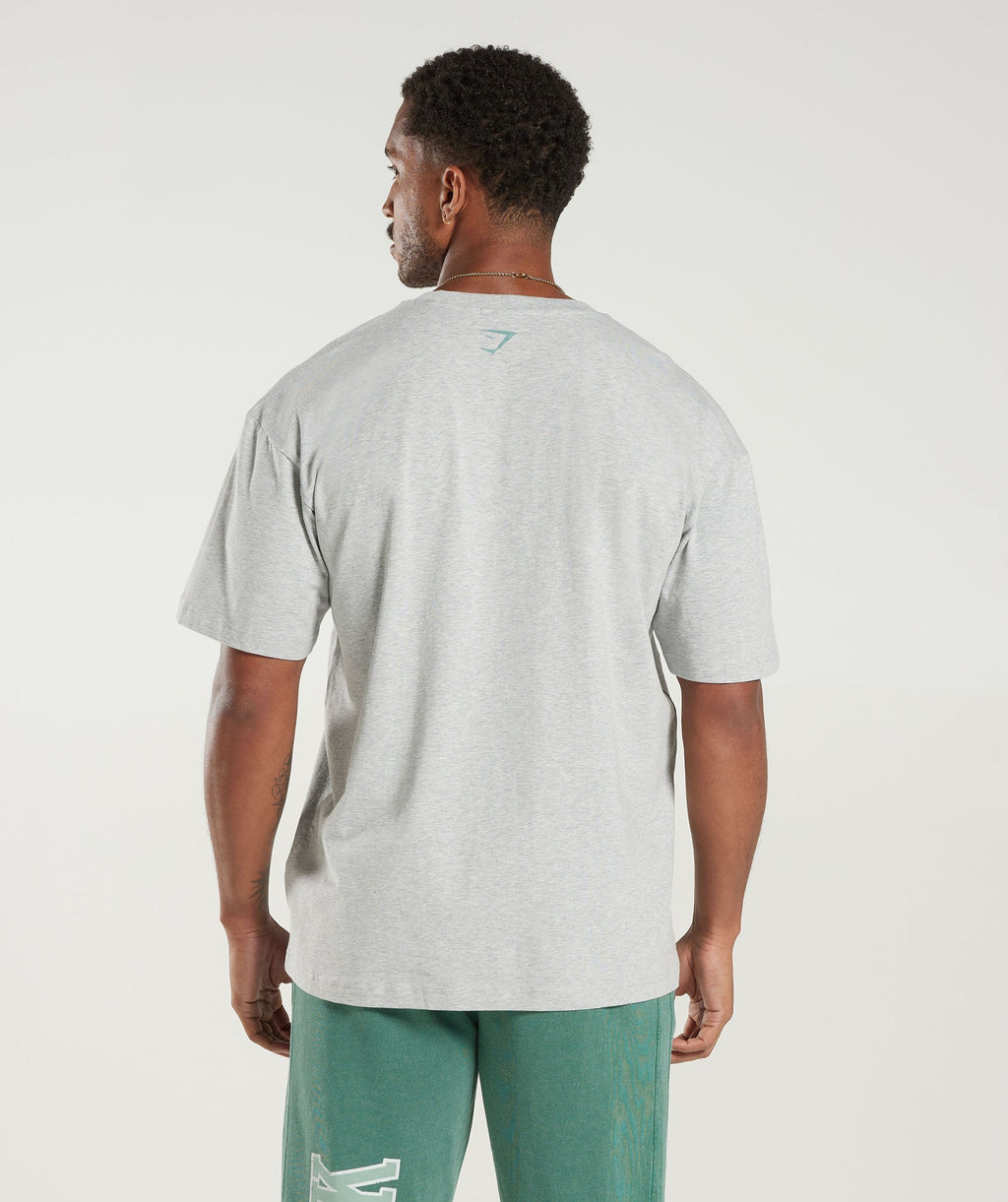 gymshark-collegiate-oversized-t-shirt-light-grey-core-marl-ss23