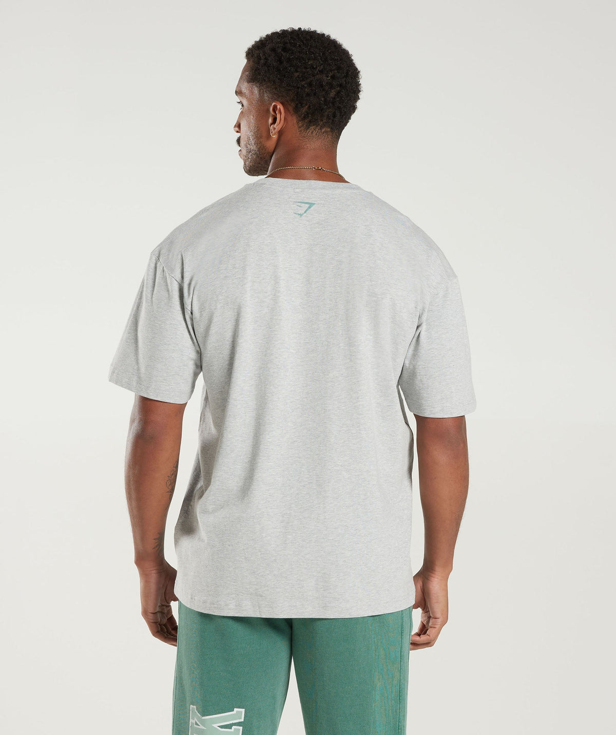 gymshark-collegiate-oversized-t-shirt-light-grey-core-marl-ss23