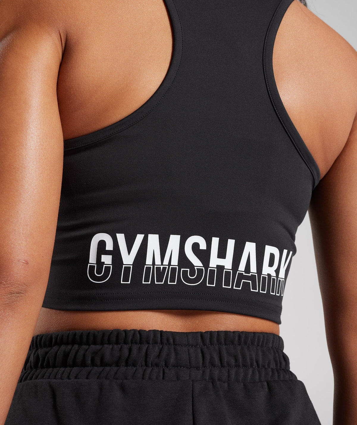 gymshark-fraction-crop-tank-black-ss23