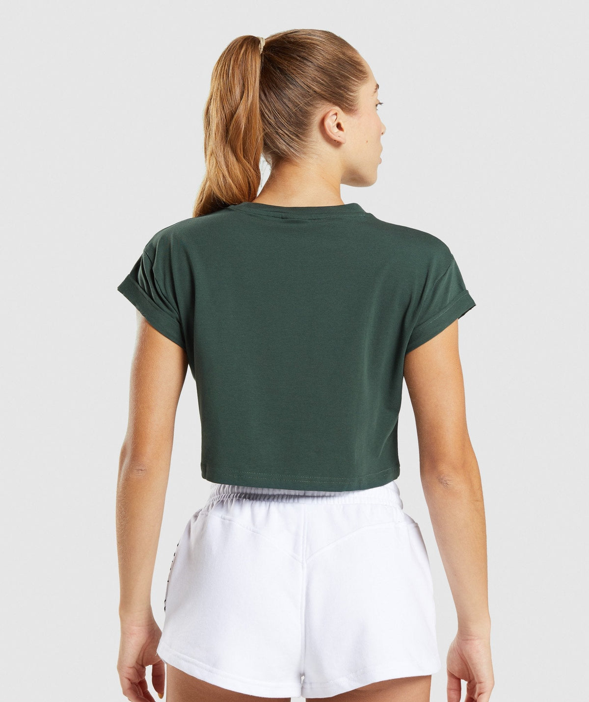 gymshark-legacy-graphic-crop-tee-dark-green-aw21