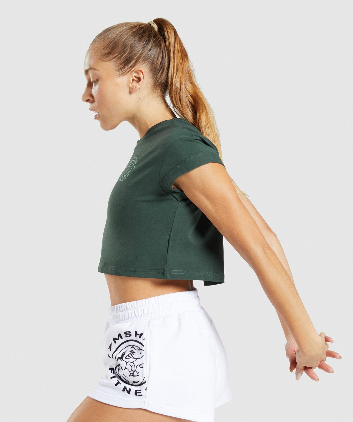 gymshark-legacy-graphic-crop-tee-dark-green-aw21
