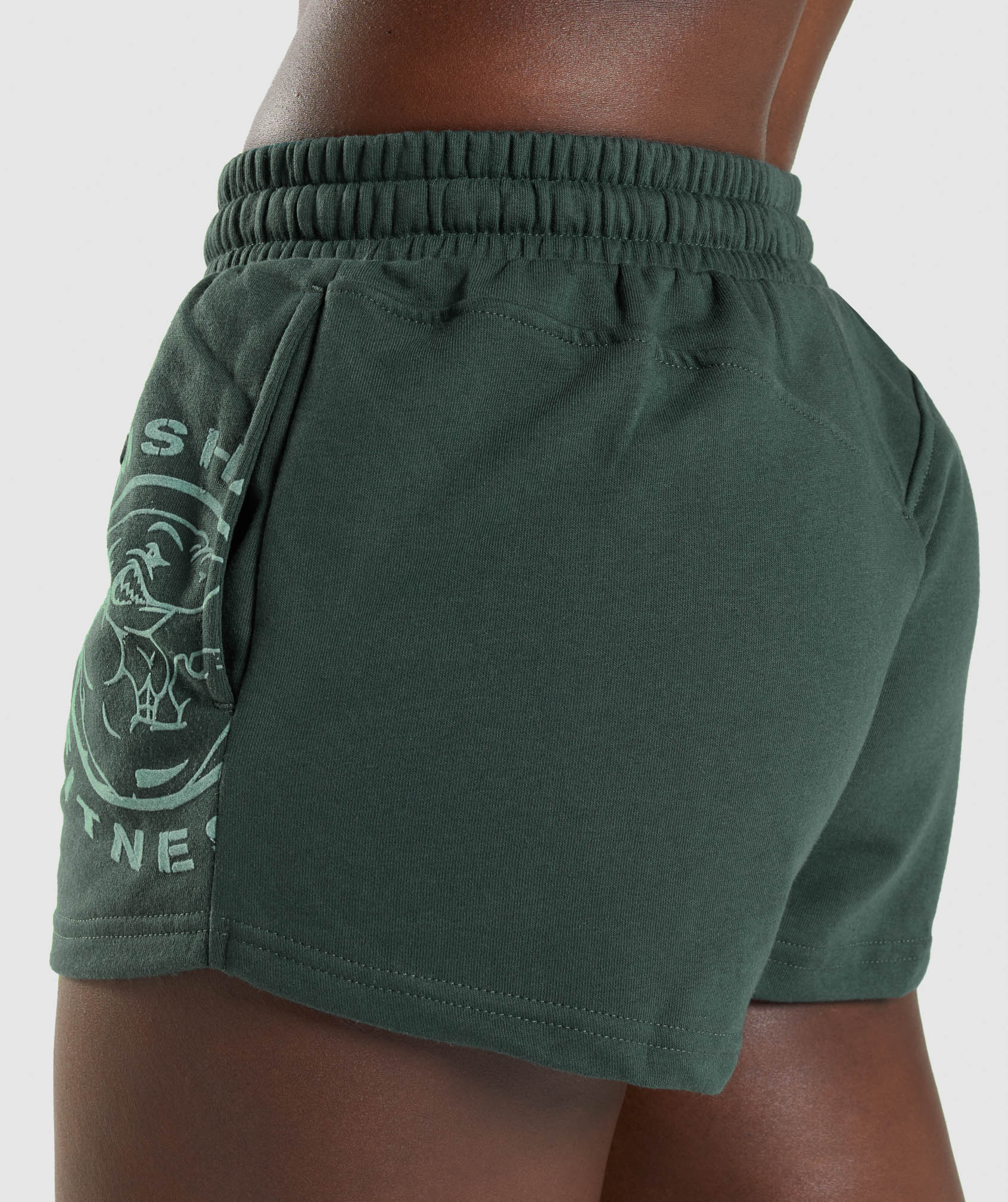gymshark-legacy-graphic-shorts-dark-green-aw21