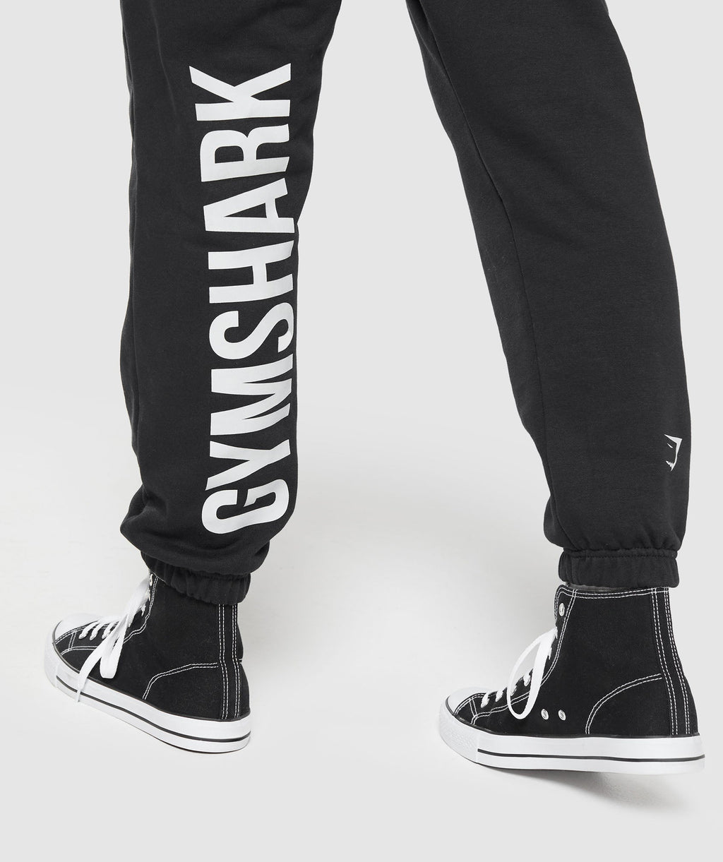 gymshark-training-department-graphic-oversized-joggers-black-aw24