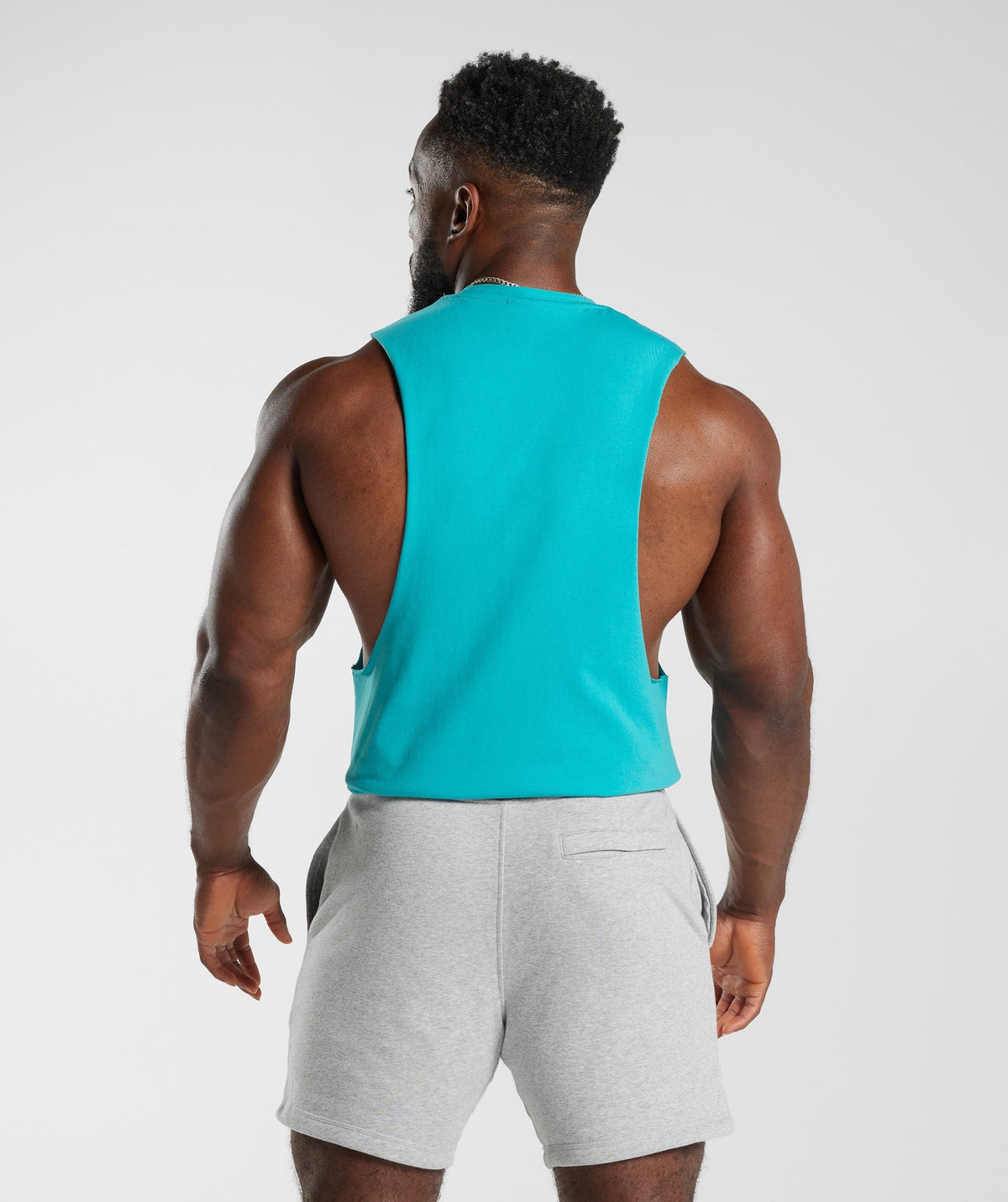 gymshark-retrowave-drop-arm-tank-aegean-blue-ss23