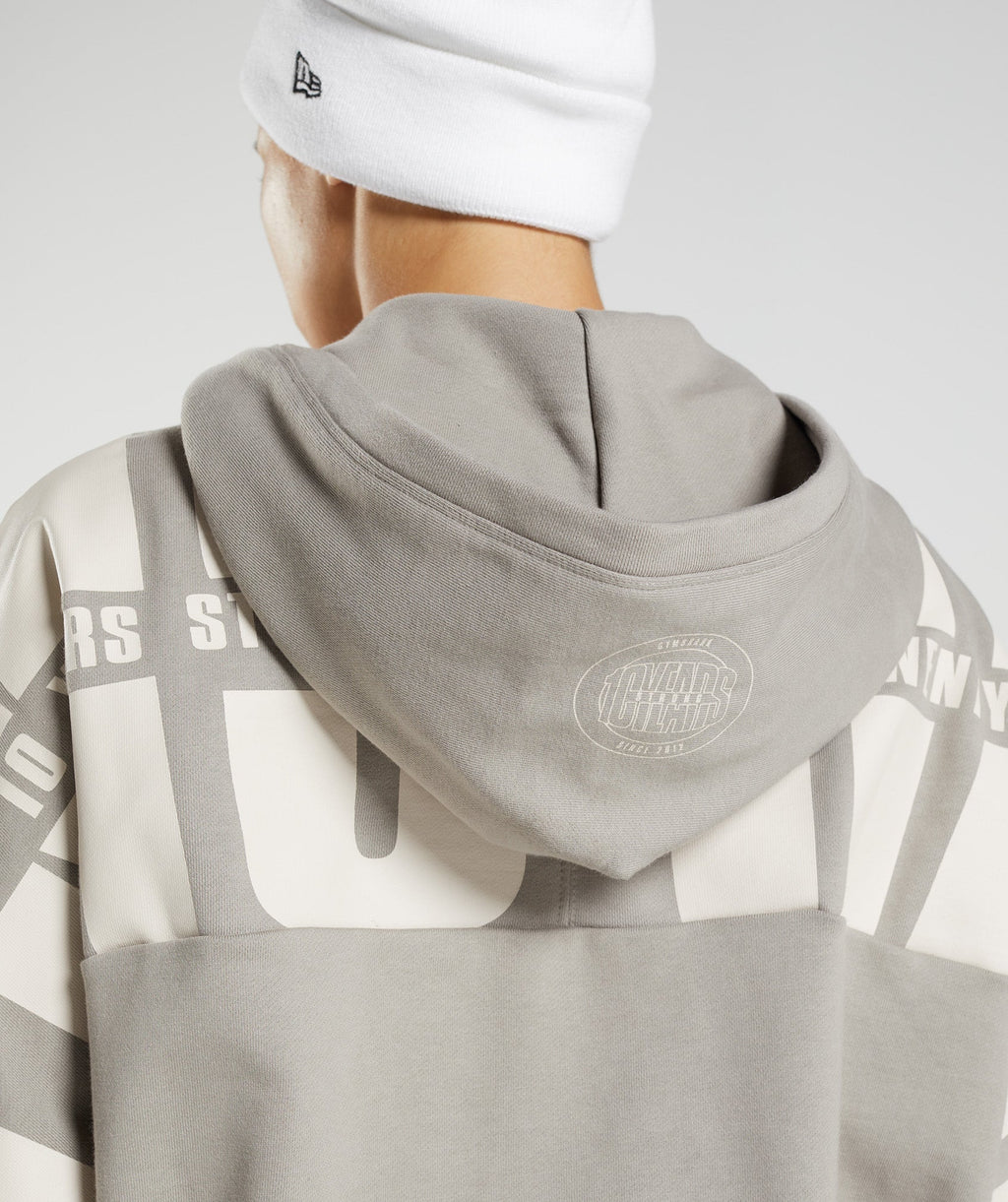 gymshark-gs10-year-hoodie-ecru-brown-aw22
