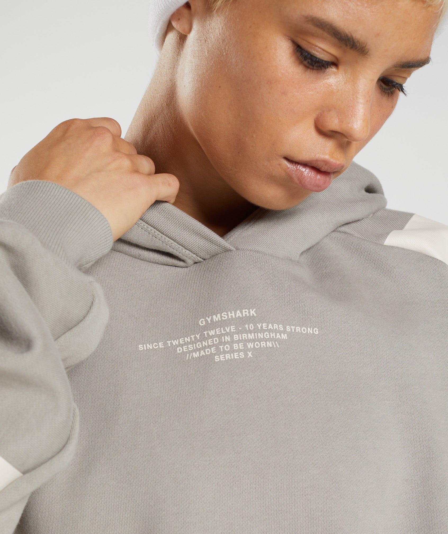 gymshark-gs10-year-hoodie-ecru-brown-aw22