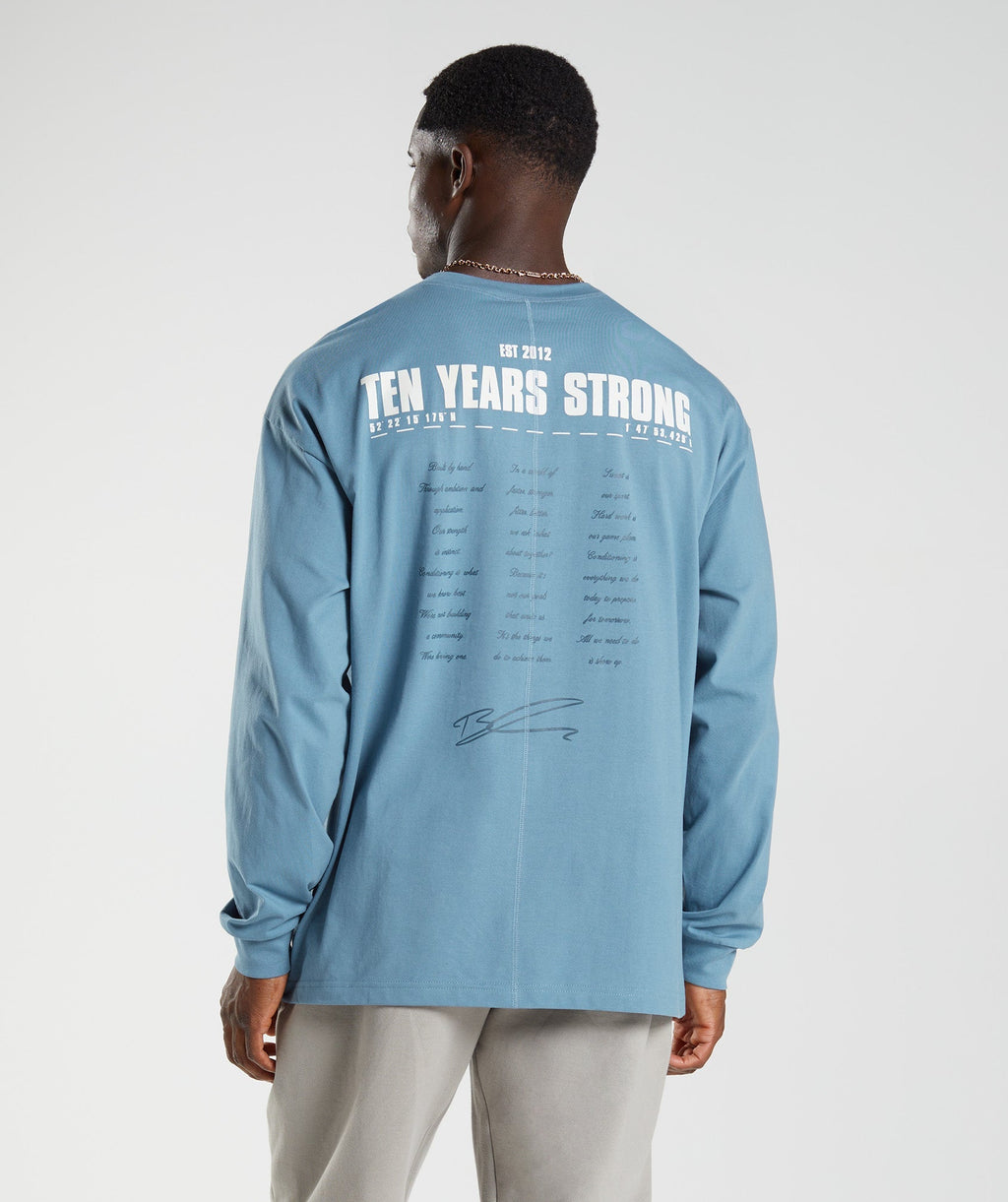 gymshark-gs10-year-oversized-long-sleeve-t-shirt-denim-blue-aw22