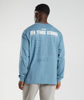 gymshark-gs10-year-oversized-long-sleeve-t-shirt-denim-blue-aw22