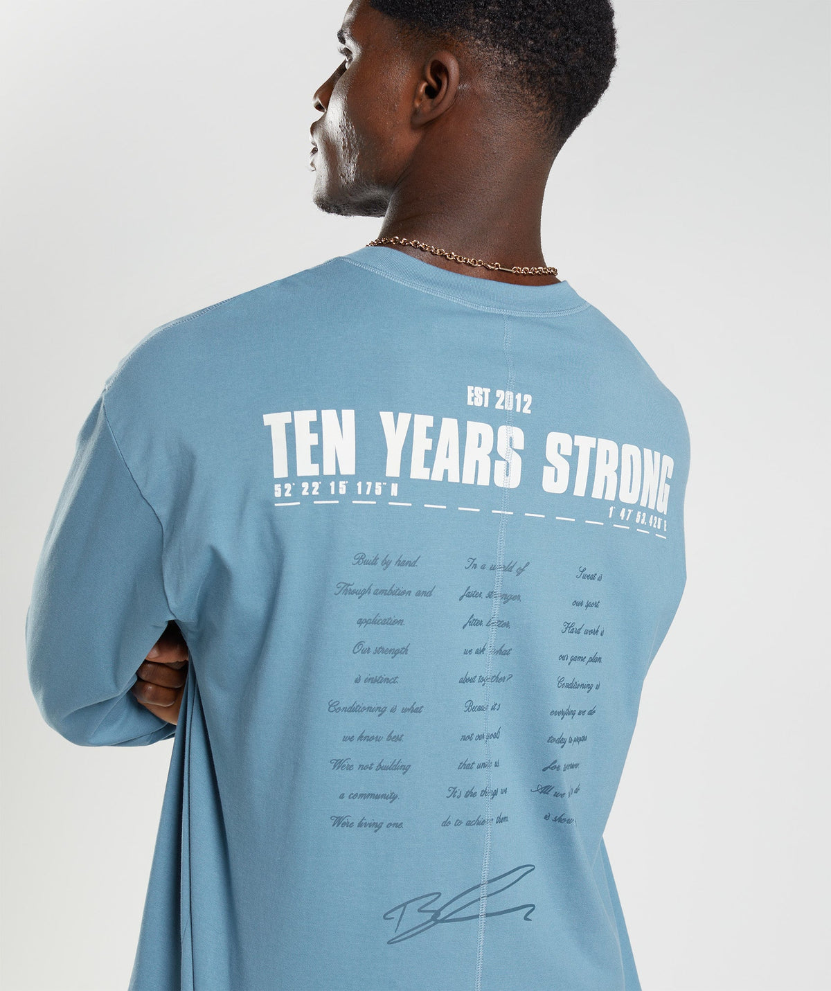 gymshark-gs10-year-oversized-long-sleeve-t-shirt-denim-blue-aw22